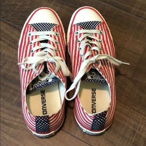 Red, white, and blue converse sneakers